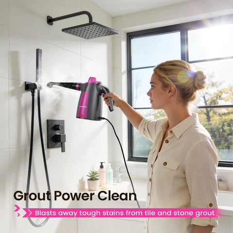 Woman using Heavy Duty Pressurized Handheld Steam Cleaner With 12 Piece Attachment Kit in bathroom, blasting grout stains with steam.