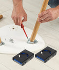 Close-up of 4-Pc Heavy Duty Furniture Movers positioned under furniture legs for easy sliding, showcasing smooth rolling wheels.