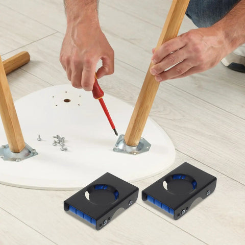 Close-up of 4-Pc Heavy Duty Furniture Movers positioned under furniture legs for easy sliding, showcasing smooth rolling wheels.