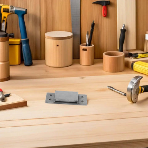 Invisible Concealed Cabinet Door Hinges for Hidden Closets and Bookcases on a wood workbench with tools, front view