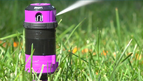 ColorStorm Gear Drive Sprinkler With Heavy Duty Die Cast Metal Base, Four Adjustable Patterns, 360 Degree Coverage shown in grass