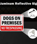 Built Solid 10x7 Inch Dogs On Premises No Trespassing Signs 2 Pack Rust Free Reflective Aluminum sign with red lettering.