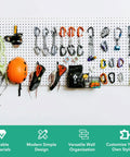 Double Pack Metal Pegboard Panels for Walls showing climbing gear and tools, white pegboard for versatile storage and organization