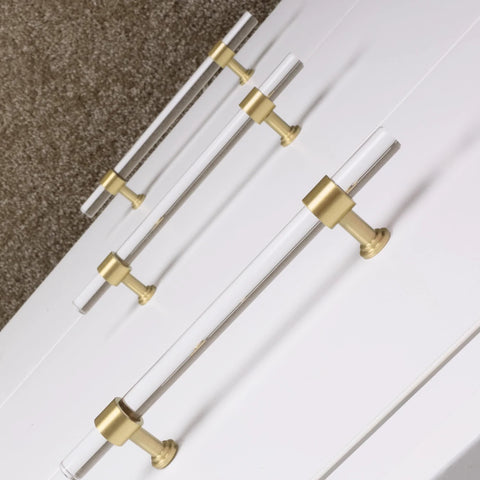 5 Pack Acrylic Cabinet Pulls With Brass Base Crystal Clear Glass Handles In Gold Finish installed on white cabinet doors