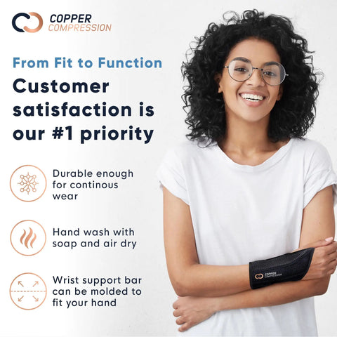 Smiling woman wearing wrist brace with copper infusion for pain relief and support in carpal tunnel arthritis tendonitis RSI and sports injuries.