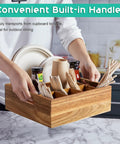 Person holding Acacia Wood Utensil Holder And Plate Organizer For Parties Six Compartment Silverware Caddy on counter