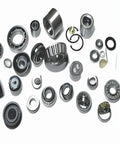 Assortment of roller bearings, including the Beefy Heavy Duty Tapered Roller Bearing Model 02872 02820, for automotive use.