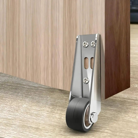 Real Deal Built Tough Heavy Duty Sliding Gate Wheels With Low Profile Silent Bearings And Load Bearing Roller Casters Smooth Rider image of stainless steel wheel and bracket mounted on a wooden door.