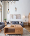 Three Light Plug In Pendant With Hemp Rope And Metal Cage Shades hanging in modern living room, vintage farmhouse style
