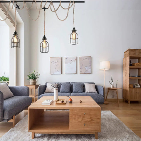 Three Light Plug In Pendant With Hemp Rope And Metal Cage Shades hanging in modern living room, vintage farmhouse style