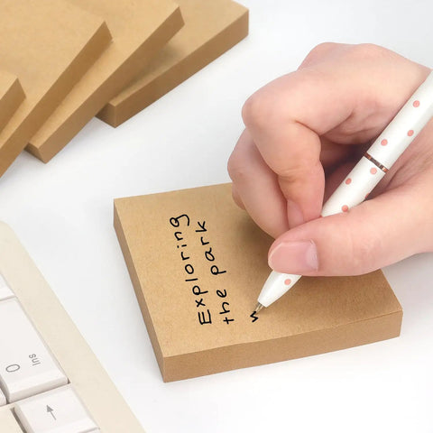3x3 Self Stick Sticky Notes Set In 6 Bright Colors For Office School And Home, kraft note with handwriting next to keyboard