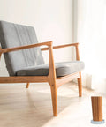 Chair on hardwood floor with Eight Pack 3 Inch Round Rubber Furniture Caster Cups Non Slip Pads For Hardwood Floors under leg.