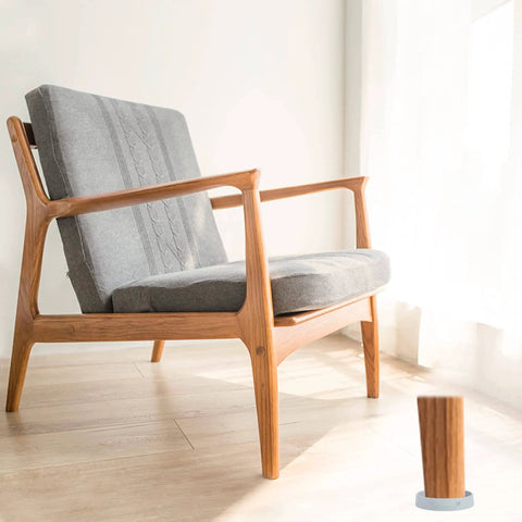 Chair on hardwood floor with Eight Pack 3 Inch Round Rubber Furniture Caster Cups Non Slip Pads For Hardwood Floors under leg.