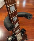 Black foam tubing on a guitar neck demonstrating use for Heavy Duty Foam Pipe Insulation Tubing Set With 1/4 Inch To 3-5/9 Inch ID