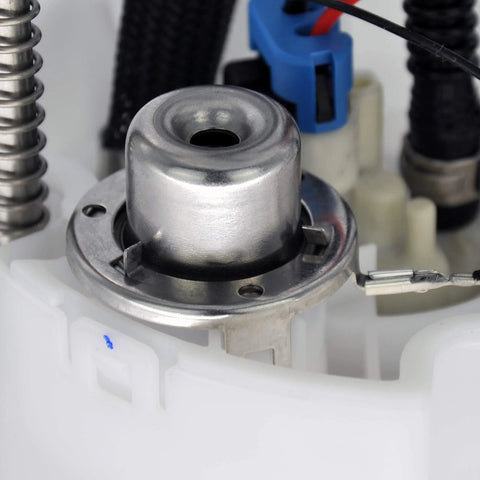 Close-up of Vphix Gas And Flex Fuel Pump Module Assembly component in 3.6L V6 van, showing metal and plastic parts.