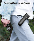 Person holding Survival Ready Bushcraft Hand Auger Wrench With Flint Scotch Eye Wood Drill Peg And Manual Hole Maker Multitool In Leather Case