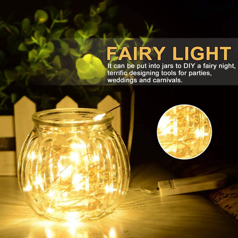 Warm White Battery Operated Fairy String Lights 10 Ft Copper Wire Set Waterproof Indoor Outdoor Decor For Weddings Christmas Holidays 2 Pack With 30 LEDs Each No Timer And Batteries Not Included Party Ready displayed in a jar.