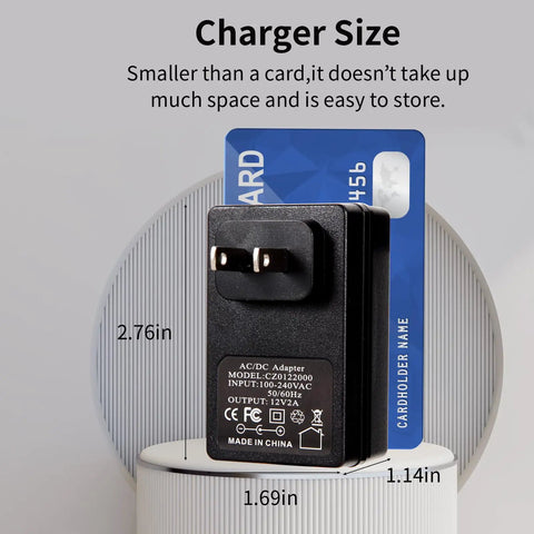6V 1A DC Power Supply Wall Charger With 5.5x2.1mm And 2.5mm DC Plugs, Universal AC Adapter next to a card for size comparison