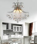 Lit Six Light Chrome Crystal Pendant Chandelier Flush Mount Ceiling Light for Dining Room with K9 Crystals in modern setting