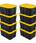 Heavy Hitter Heavy Duty Storage Totes With Secure Lids For Garage, 27 Gallon Stackable Plastic Bins 8 Pack stacked black bins with yellow lids.