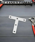 Beefy Heavy Duty Stainless Steel Corner Bracket Plates, thick T shaped angle braces, on wooden surface with tools