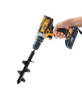 Hand using drill with Set Of 3 Garden Auger Drill Bits For Planting 1.6 By 12 Inch, 2.6 By 12 Inch, 3.5 By 12 Inch Deep Holes Bulb And Bedding Plant Augers.