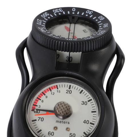 Compass and depth gauge with dual dials for navigation and measuring depth, crucial for underwater exploration.
