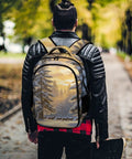 Back view of person wearing Winter Icicle Deer Woodland Printed Unisex Backpack in outdoor setting
