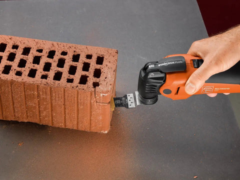 Starlock Plus E Cut Carbide Pro Saw Blade TiN Coated cutting a brick