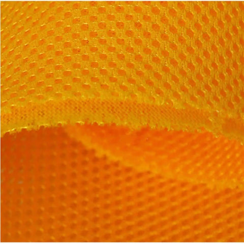 Close-up of orange textured fabric, not the Three Layer 3D Sandwich Mesh Fabric Elastic Mesh Cloth for air beds and sofas.