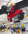 Beefy Electric Trolley For Power Hoist, 1 Ton Capacity, 2204 Lbs Load, installed on I-Beam with red frame, workshop setting