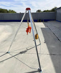 Rock Solid Manhole Rescue Tripod With Heavy Duty Winch And Fall Arrest Gear Built Tough Aluminum Rig for Confined Space Emergencies.
