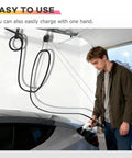 Universal EV Charger Cable Organizer With Retractable Overhead Mount For A Slick Garage Setup, shown in use with one hand.