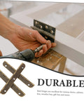 Hands installing a heavy duty piano hinge set with a power drill on a cabinet frame, showcasing durable antique finish hardware for DIY projects.