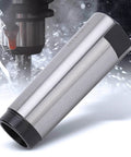 Side view of MT4 to MT3 taper drill sleeve reducing adapter, high-speed steel, quenched, silver with black ends