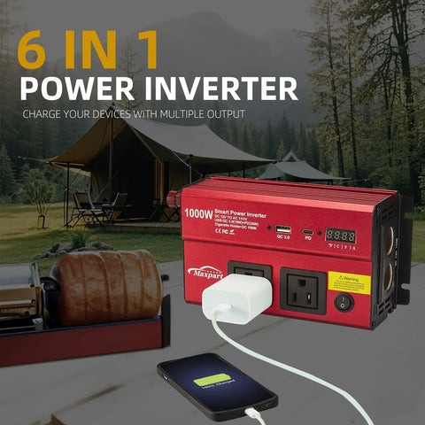 1000 Watt DC To 110V AC Vehicle Power Inverter With Dual AC Outlets USB C PD 30W Fast Charge Inline Cigarette Adapter For Slick Rig And Backroad Use in outdoor setting with smartphone charging.