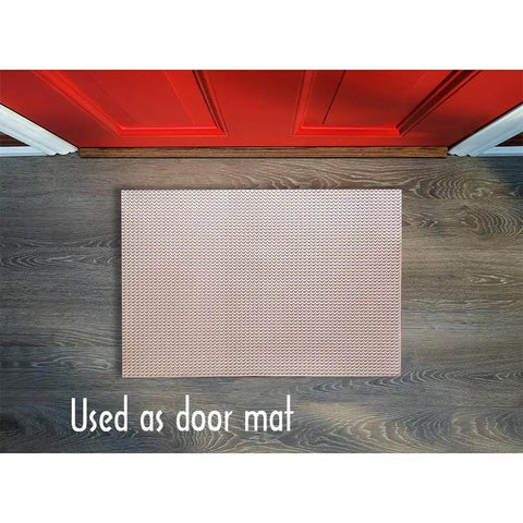 Multipurpose Rubber Sheet For Shoe Soles And Heel Repair And Furniture Pads 0.08 Inch Thick used as a door mat on wooden floor.