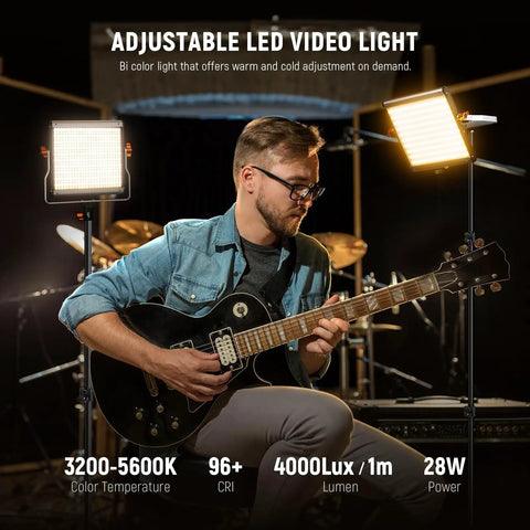 Musician playing guitar with Dimmable Bi Color LED Video Light Kit with 480 LEDs per light 3200K to 5600K CRI 96 Plus U Bracket and 75 Inch Tripod Stand for YouTube Vlogs Studio Photography and Live Streaming illuminating him.