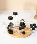 Snag A Solid Stack Of Thirty Dope Little Glass Vials Perfect For Mixing Essential Oils Or Bottling Custom Perfumes With Secure Screw Caps That Stay Leak Free During Travel And Keep Your Favorites Fresh. Collection of 30ml clear borosilicate glass vials with black screw caps on a wooden tray.