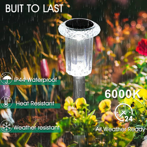 10 Pack Solar Powered Path Lights Waterproof Stainless Steel Stake Lights For Pathway Garden Yard Walkway Driveway Lawn Patio Outdoor Decor Lit Cool White Glow With One Piece Lamp Head And Diamond Look Acrylic Lens under rain in garden setting