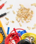 All In One 36 Pcs Electrical Quick Splice Wire Terminals Kit With Piggyback Spade Connectors Double Spade Connectors And Chair Terminal Quick Disconnect Adapters One Quarter Inch Gold Tabs Two Male And One Female, showing brass terminals and wires with a multimeter