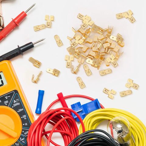 All In One 36 Pcs Electrical Quick Splice Wire Terminals Kit With Piggyback Spade Connectors Double Spade Connectors And Chair Terminal Quick Disconnect Adapters One Quarter Inch Gold Tabs Two Male And One Female, showing brass terminals and wires with a multimeter