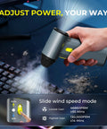 Person using Powerful 130000 RPM Turbo Brushless Air Duster with Aluminum Alloy Body for cleaning computer keyboard.