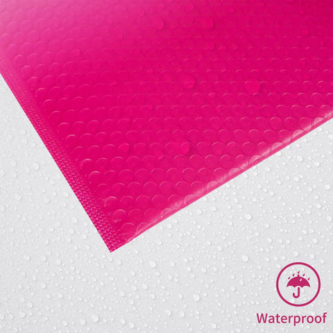 Close-up of waterproof Pink Bubble Mailers 8.5x11 Inch 30 Pack with self seal and cushioned protection for shipping, shown against water droplets.