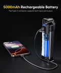 Magnetic 1500 Lumen Rechargeable Work Light With 5000mAh Battery, 4 Modes And UV 395nm charging a phone via USB-C.