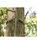 Close-up of 20 Ft Rapid Climbing Sticks For Tree Stands And Hunting, 4 Pack Of 5 Ft Sections, attached to tree, showing secure strap.