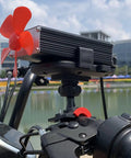 Crush Range Anxiety With This Slick Solar Generator Range Extender That Smoothly Boosts Your Ride Converting Low Voltage To High Voltage Efficient EV Battery Booster Featuring Dual Cooling Fans For Outdoor Trips 12V 125V, close-up of a red cooling fan on aluminum casing.