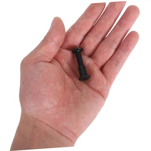 Single heavy duty steel screw in a hand, part of the Heavy Duty Steel Screws And Nuts 170 Set Assortment Kit For Furniture Assembly.