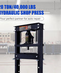 Heavy Duty Hydraulic Shop Press With Adjustable Benchtop Table And Solid H Frame Steel Construction, 20 ton capacity, in garage setting.