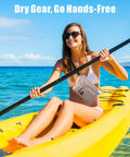 Woman kayaking with Waterproof Fanny Pack Pouch For Beach And Cruise Trips With Roll Top Closure And Zippers Keeps Your Phone Wallets